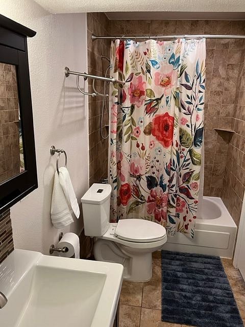 Bathroom accessible from public hallway and privately accessed from Queen bed 2