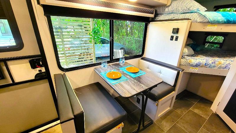 Dining area, also can be used for work space.
Note: top bunk has been removed for more room for bottom bed.