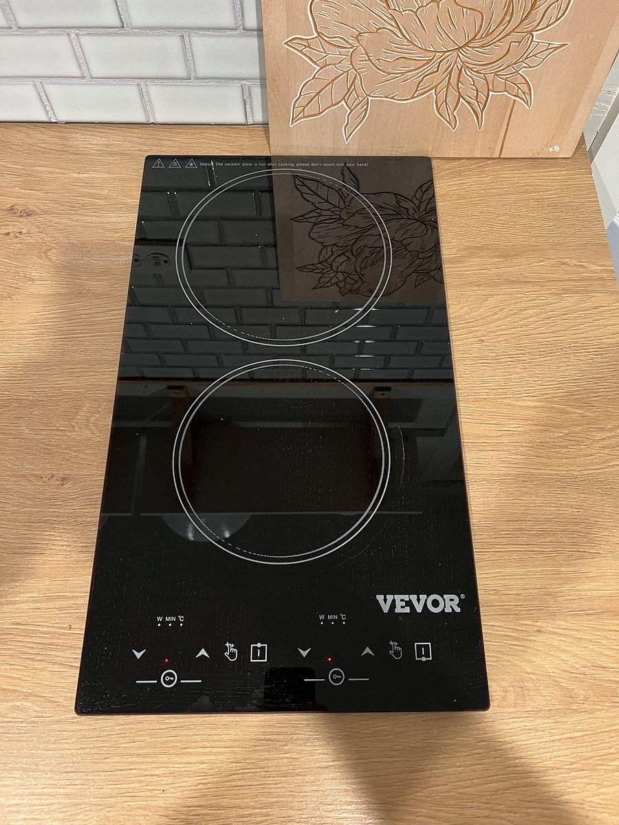 Double induction burner stove top located on the right side of the kitchenette.