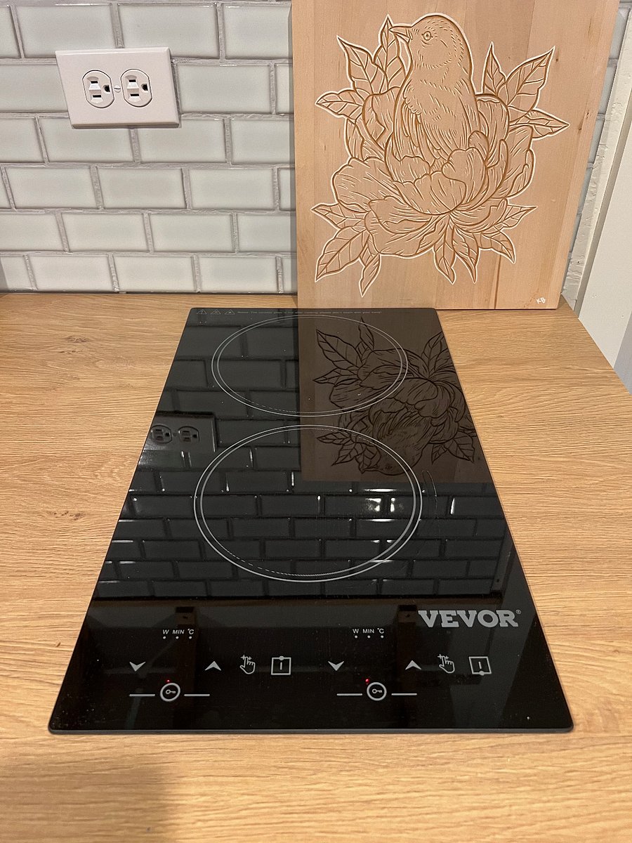 Double induction burner stove top located on the right side of the kitchenette.