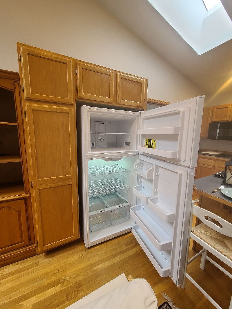 Full sized refridgerator, clean and sanitized.