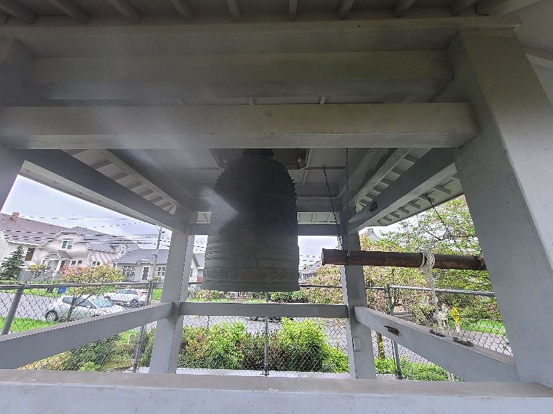Bell by house