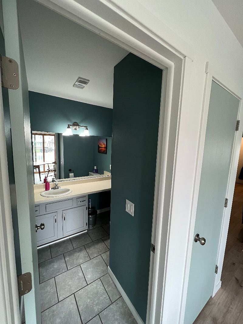 Half bath on main floor. Plenty of storage here too! Closet to the right, I store kitchen items in.