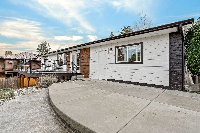 Back of house showing concrete deck