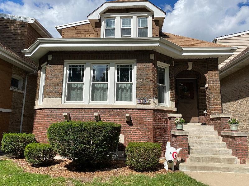 Front of house  (The bullseye Target dog is gone now. Used to be great way to identify my house. I'm looking for a replacement mascot!)