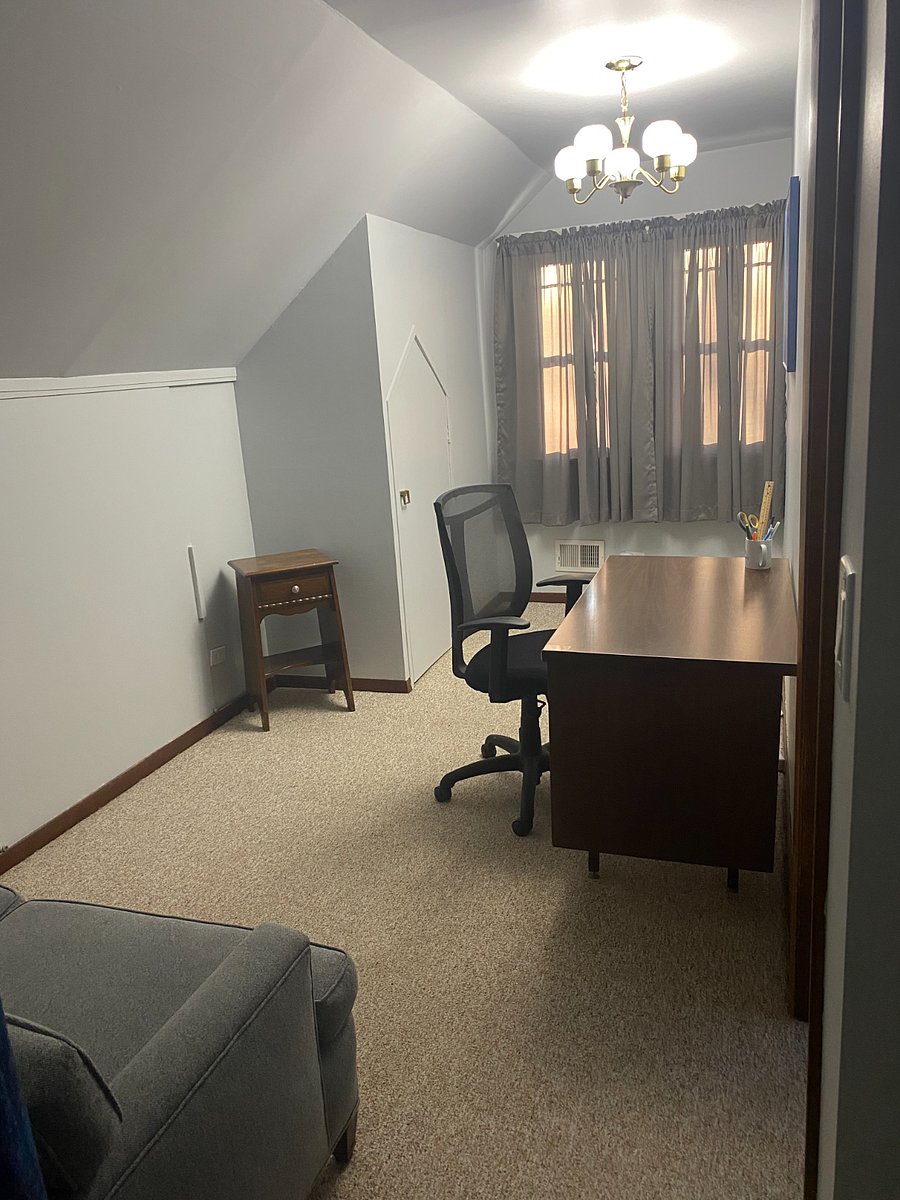 Office/sitting area outside Bedroom #1 offers space to study, read, or relax outside bedroom. 