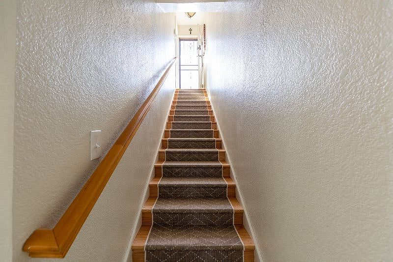 Gently-sloping stairs from back door entrance to guest area