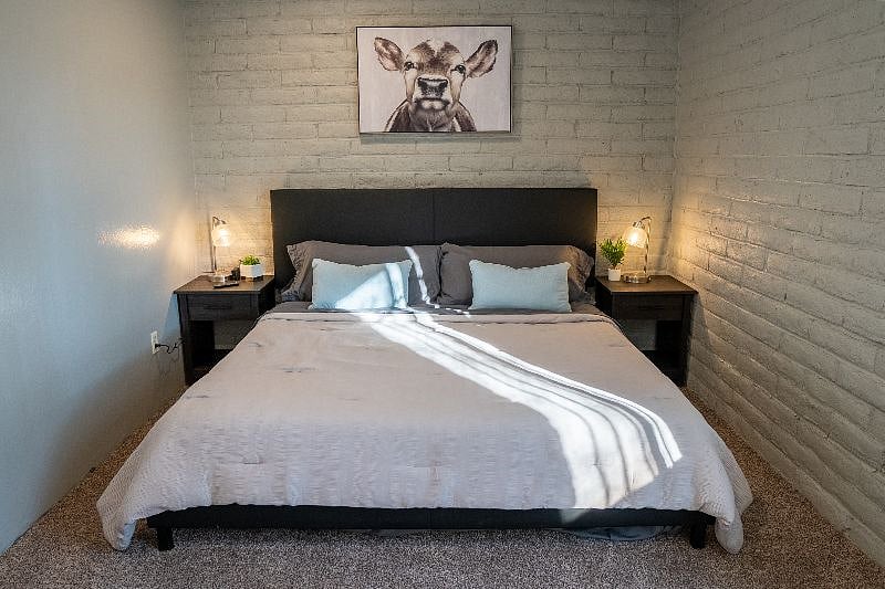 Bedroom 2, watched over by "Cal the Calf"
Both bedrooms equipped with 60W Anker USB charging station, to simultaneously recharge up to 6 personal electronic devices (left hand side of bed in photo).
Not Picture: mounted 43" Amazon Fire Smart TV (bottom left of this photo)