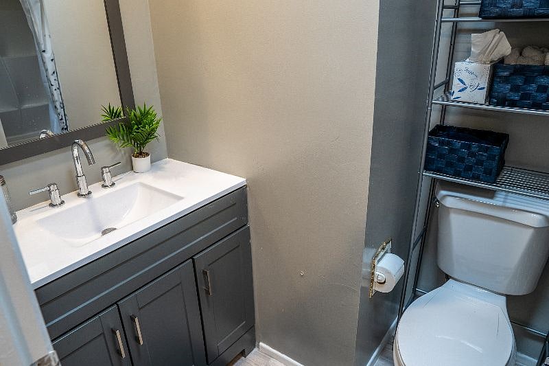 Hall Bathroom offers new toilet, vanity and tub/shower