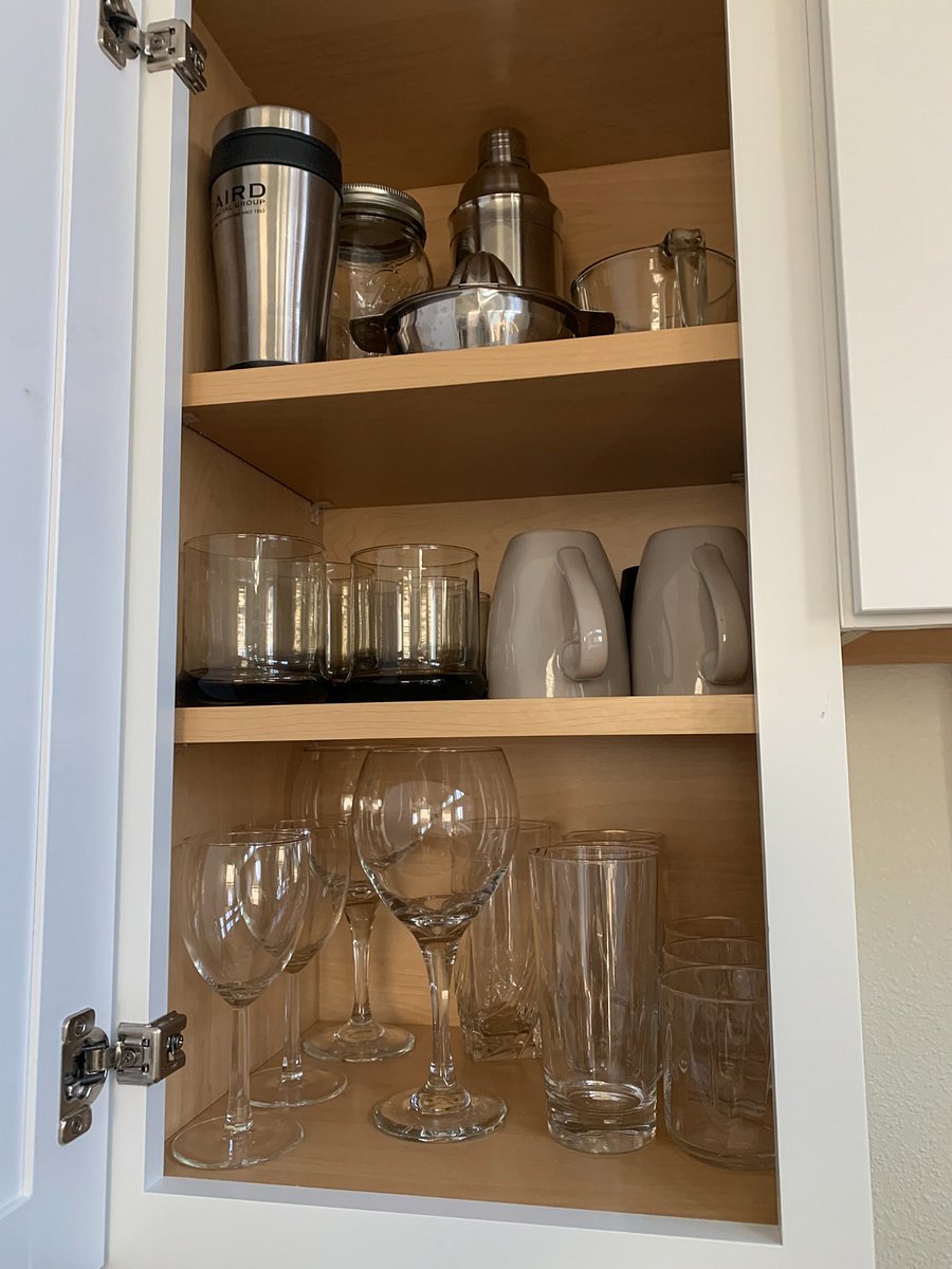 All the glasses, mugs, and to go coffee mug.