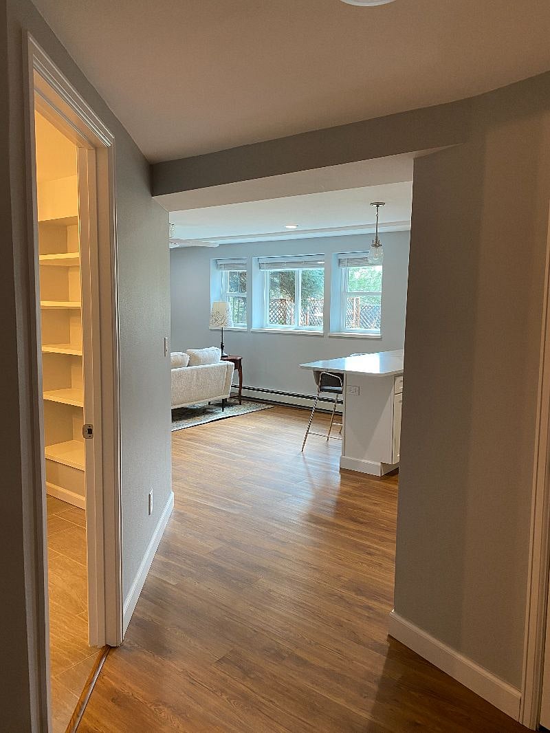 Entrance from stairs to kitchen/living room.