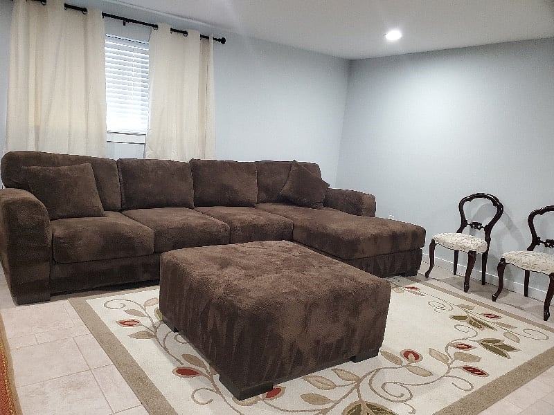 Shared living room space with huge ,soft sofa to enjoy watching your Netflix movies !