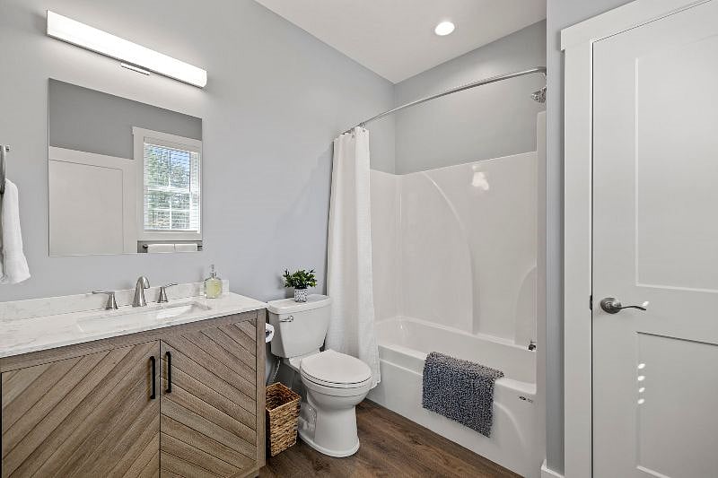 Full bathroom with lots of storage connected within the King Bedroom #2.