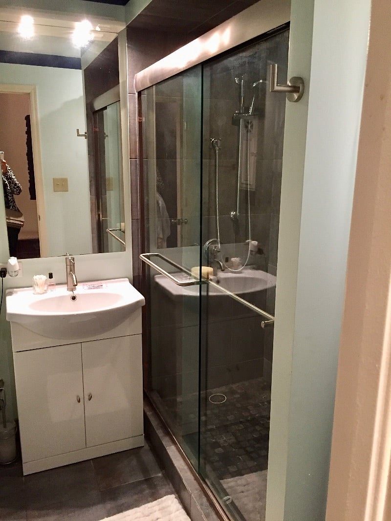 Bathroom with Linen Area and Wall Cabinet