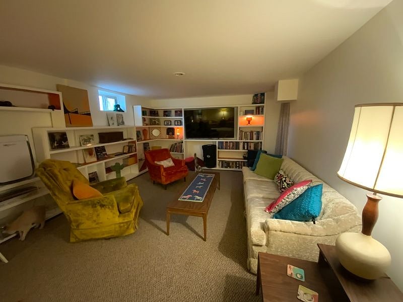 Downstairs Lounge and TV room with large smart TV.  Perfect for movie nights! 