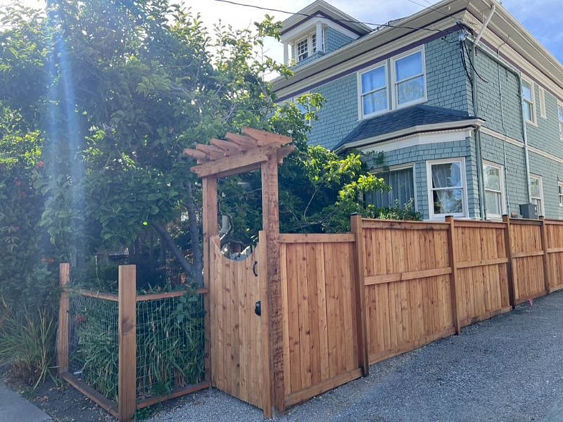 Gated/locked gate private entrance next to main house.