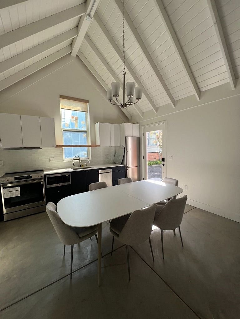 Full kitchen with dishwasher, washer and dryer