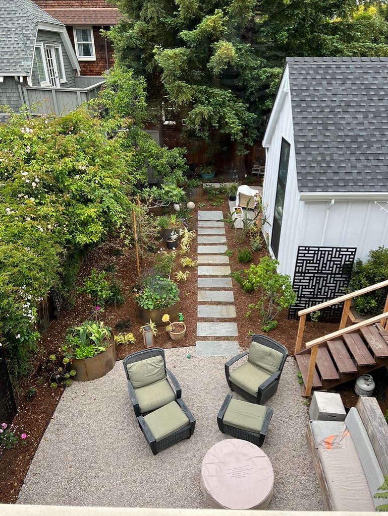 view from upstairs of main house. Cottage on right.