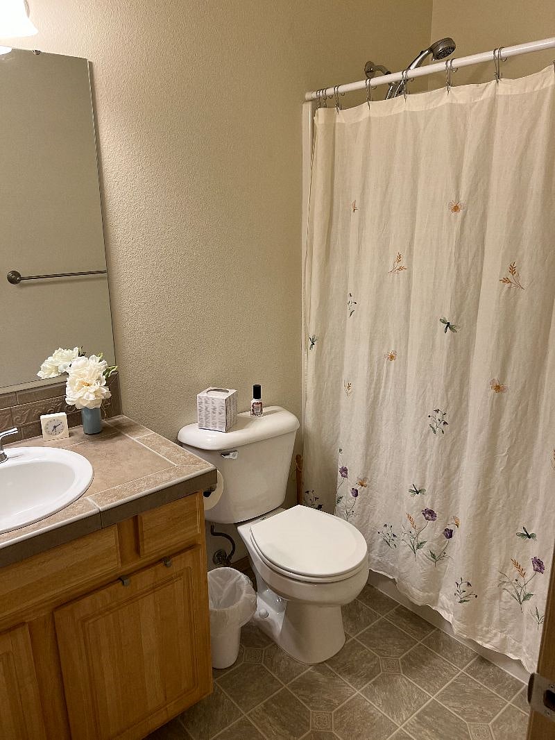 Second bathroom located at the front of the house, between 2nd bedroom and office