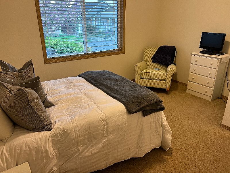 2nd bedroom located at the front of the house and includes a small walk in closet