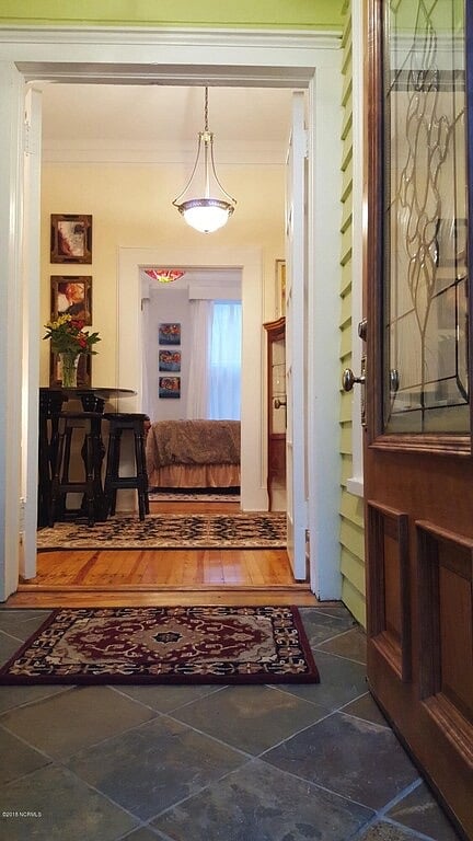 Foyer entrance with high top table to seat five.