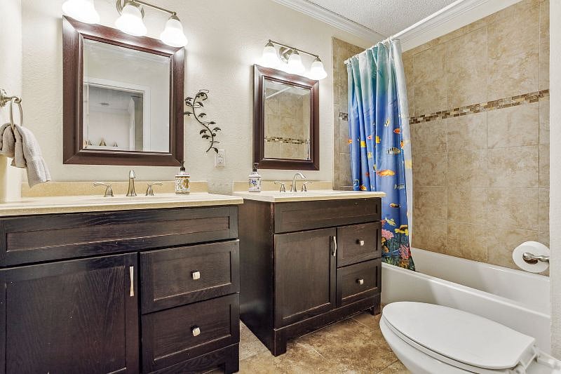 Upstairs bathroom with double sinks