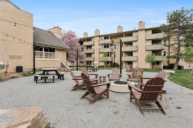 Outdoor sitting & BBQ area with water feature and lights