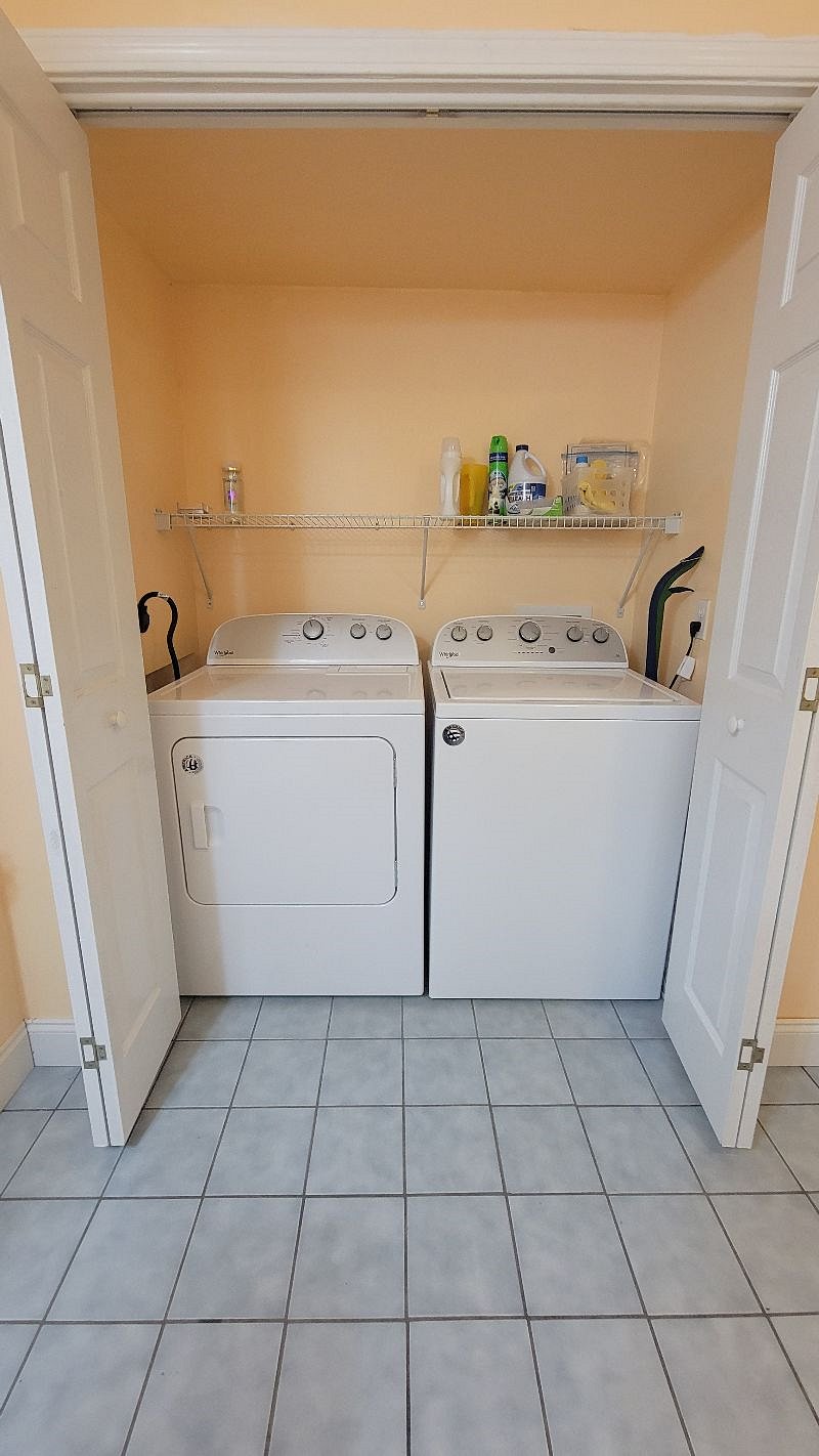 Laundry in bathroom closet