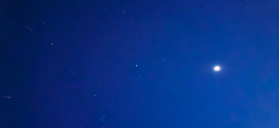 Close to the highway, yet just far enough away that you can see stars clearly at night. This photo was taken from your bedroom balcony.