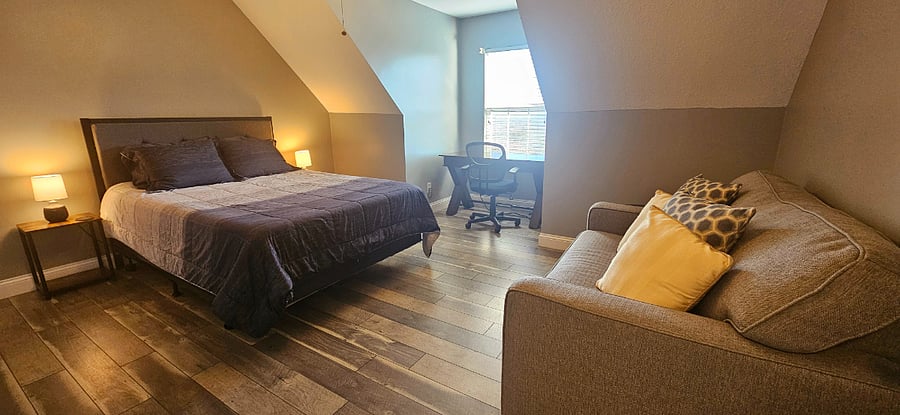 2nd bedroom has a queen bed and desk with chair. Get your work done while enjoying a view of the Smoky Mountains!