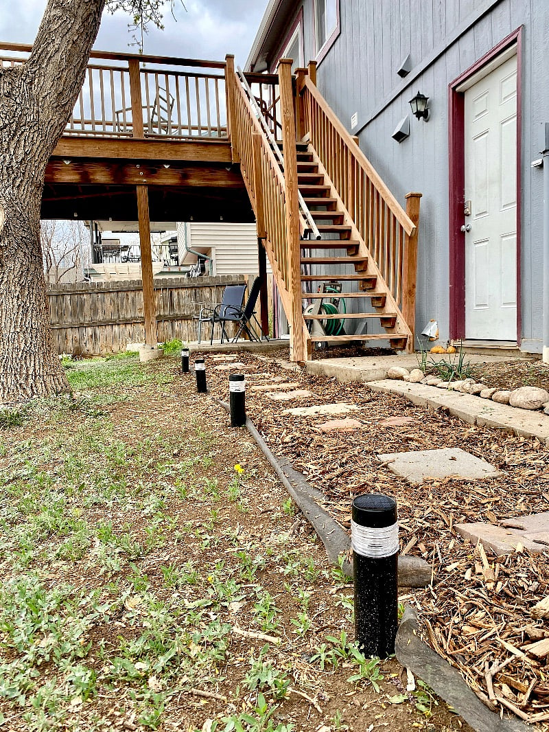 Lighted pathway to studio entry door