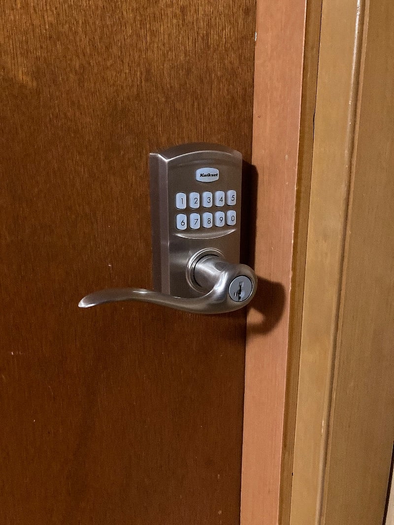 This picture shows each bedroom's door is electronic Bluetooth or push button to