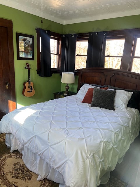 Queen size memory foam mattress. Natural light with darkening curtains