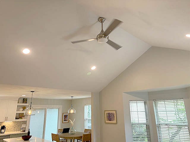 Vaulted ceiling with large ceiling fan