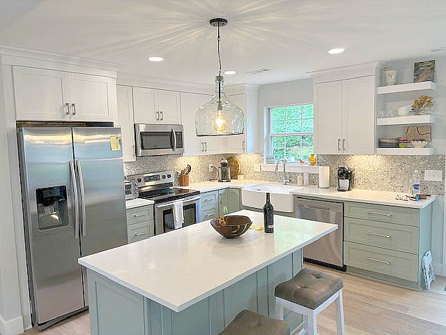 Newly remodeled kitchen with modern cookware/appliances