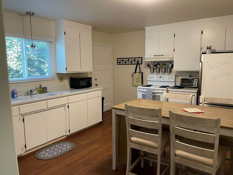 Eat in kitchen with stove, Refrigerator/Freezer, microwave, coffee maker & toaster oven.