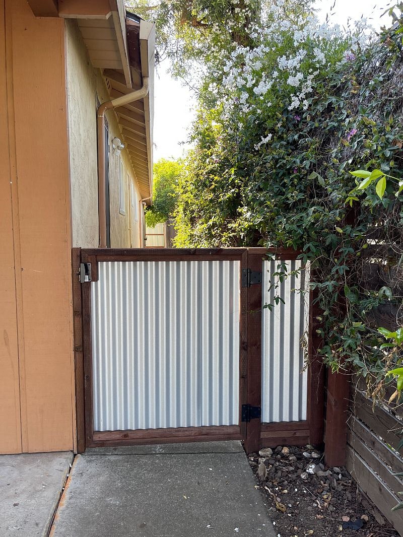 Side gate to back entrance and patio