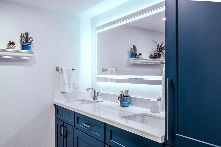 Giant LED mirror, dual sink vanity, lots of storage.