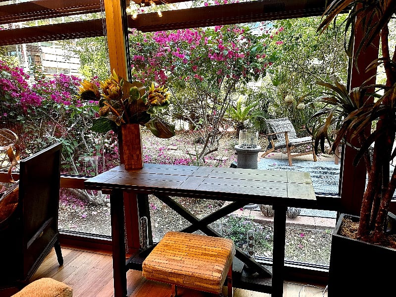 Plenty of places to pull out your computer and do your work looking out at the Gorgeous backyard.