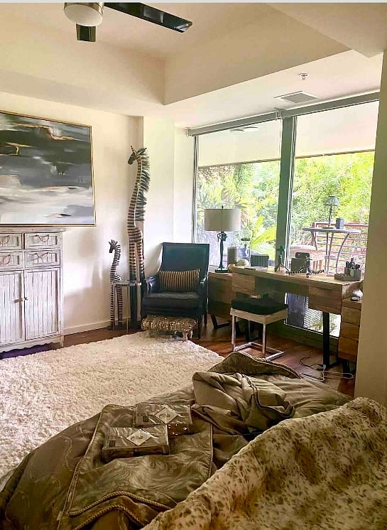 Master bedroom with a large walk-in closet. The desk looks out over the backyard patio!
