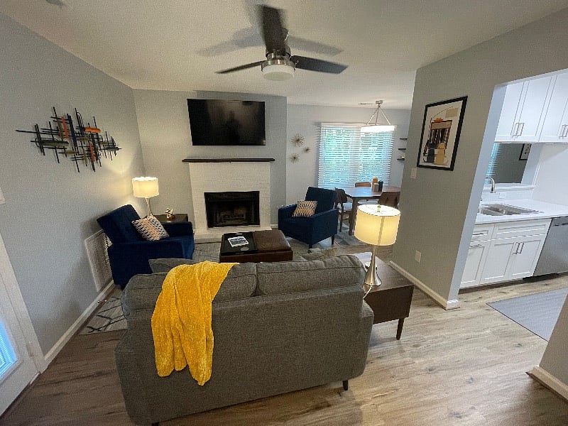 Easy, open-concept design flows from living room to fully-stocked kitchen and pass-through dining area. 