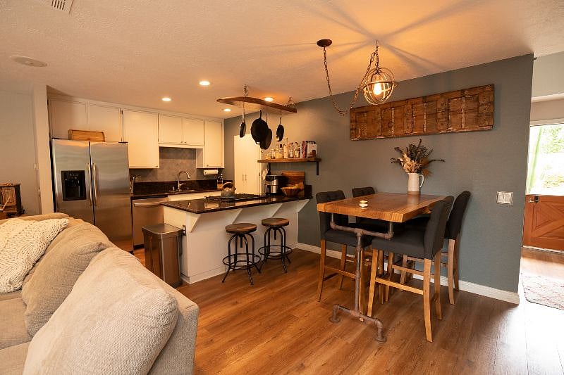 View of kitchen & dining area from living room.