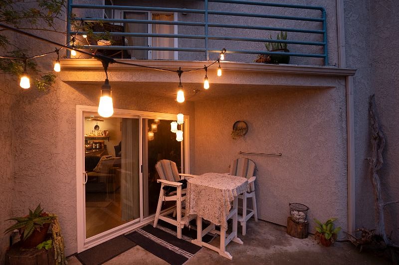 View of both patios. Downstairs patio is off of the main living area. Upstairs patio is off the master bedroom.