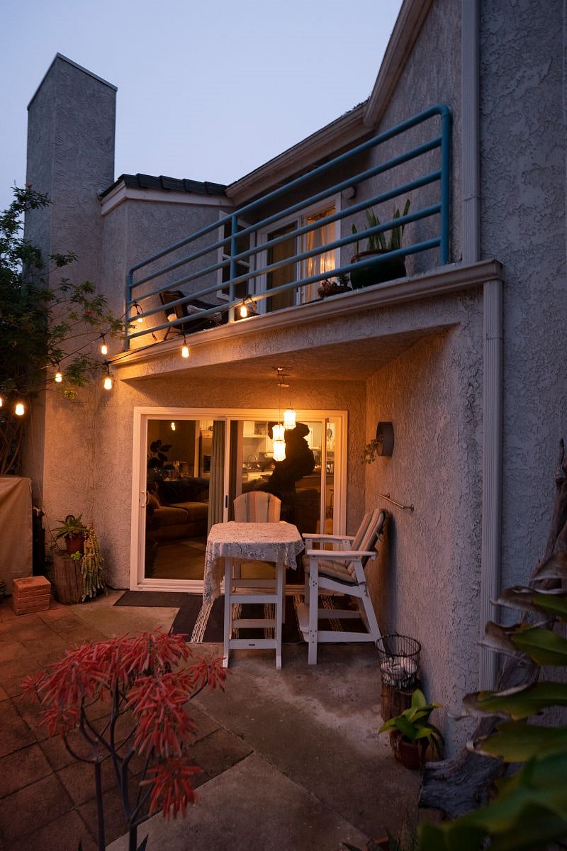 View of both patios. Downstairs patio is off of the main living area. Upstairs patio is off the master bedroom.