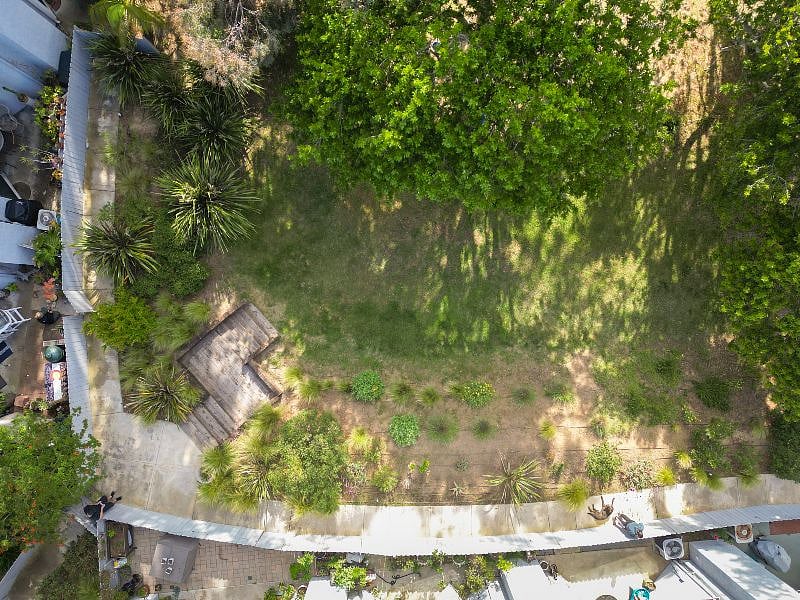 Drone aerial picture of the outdoor fenced yard. Plenty of outdoor space to read & watch the hummingbirds.