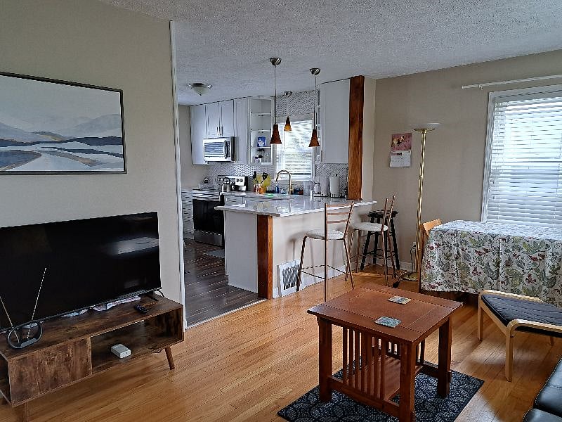 open & roomy floorplan from kitchen to living room