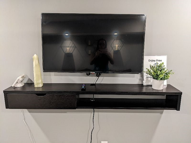 Smart TV. Comes with free wifi, local channels and streaming channels.