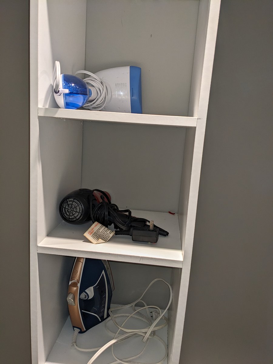 Master's Walk-in Closet Pic 2: includes, steamer, iron and hair dryer