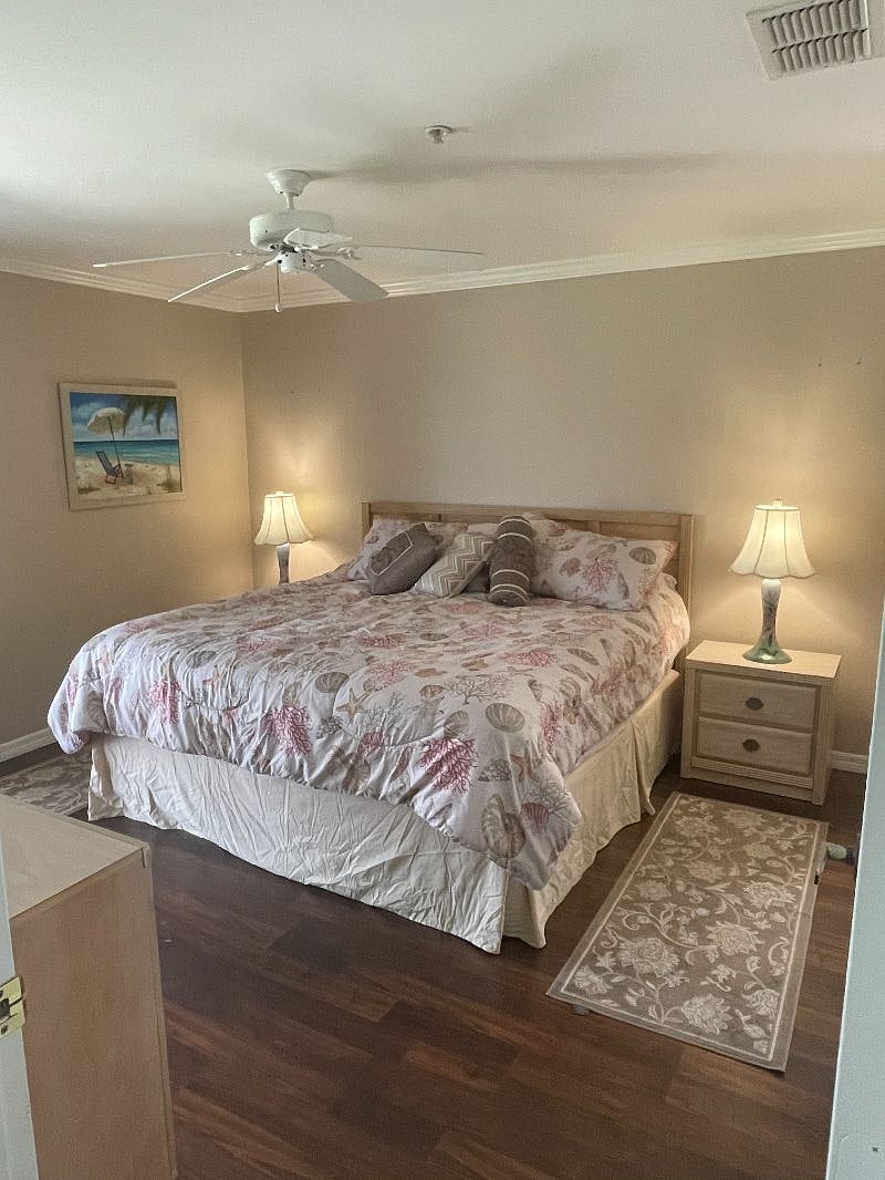 Master Bedroom - you can see the sunrise through the patio door in the bedroom