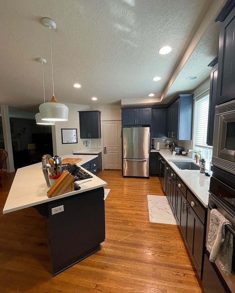 Newly remodeled kitchen with full size fridge plus another full size fridge in the garage. 